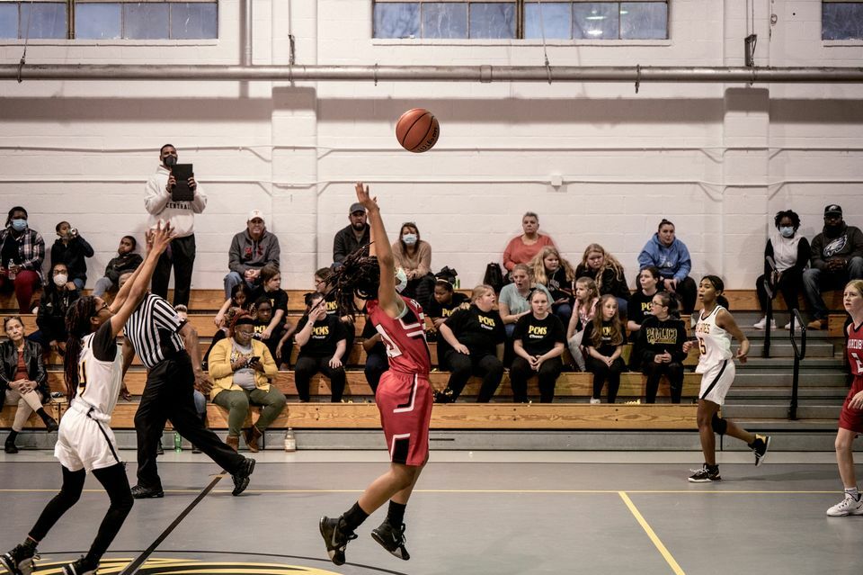 The undefeated girls’ basketball team and cheerleaders at Pamlico County Middle School